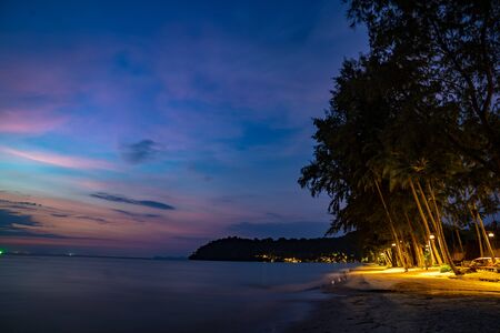 Purple violet sky at the beach and sea, in Twilight Time, Koh Kood, Trad province, Thailand.の写真素材