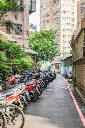 Taipei, TAIWAN - 1 Oct, 2017: Taipei local Motocycle parking environment., They are parking it all around the area., Taipei, Taiwan.のeditorial素材
