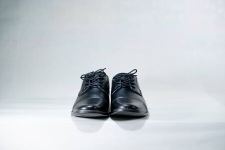 Luxuary man leather black shoe on the white isolation backtground.の写真素材