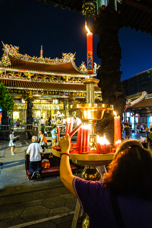 Mengjia Longshan Temple is Chinese folk religious temple, served as a place of worship for Chinese settlers in Wanhua District, Taipei, Taiwanのeditorial素材