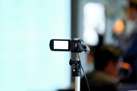 Amature and none professional video recorder static to record speaker in small seminar at conference...