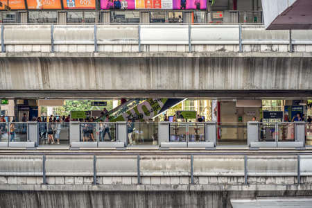 Bangkok, Thailand - 29 Dec, 2019: Local Thai people and travelers walking and waiting around the BTS Skytrain - Siam Station floor for transport around Bangkok in the day, Thailandのeditorial素材