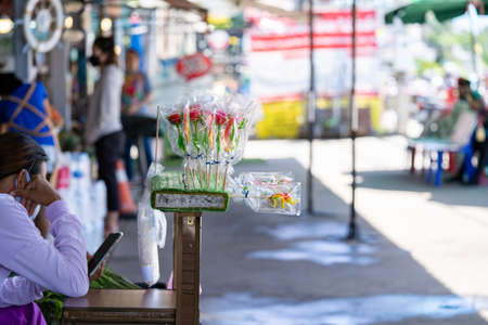 Vintage Candy in Art plant and animal shape such as elephent and flower. It's stick on the foam for sale at the front of fresh market.の写真素材