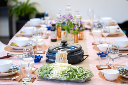 Sukiyaki Premium and Luxury Dinner Set for Celebration with special VIP guests. They have the raw material, beef, pork, chicken, egg, tofu, vegetable, shrimp, shell, squid.の写真素材