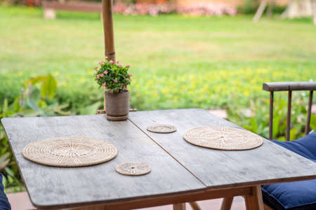Thailand Northern traditional modern combination wood table and chair set with wicker plate on it in...