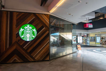 Bangkok, Thailand - 30 Apr 2021, Starbuck Logo on Round light box at art wood pattern design in...