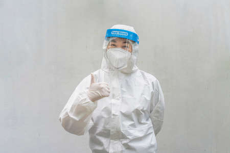 Portrait of the Asian Medical Staff in PPE suit isolated on white background. Clipping Path.の写真素材