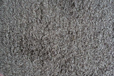 Close up used white - gray - brown doormat for any old vintage design style.の写真素材