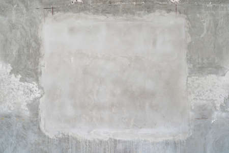 Cement texture wall for wallpaper and text quoted with the flate frame inside of it for minimal style.の写真素材