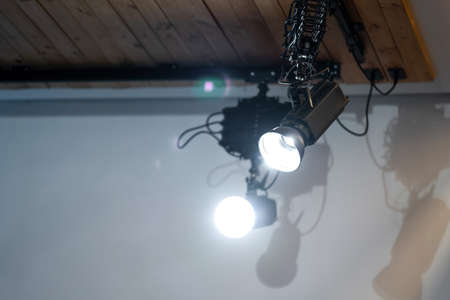 spotlight led is hung on to wood ceiling in the event room.の写真素材