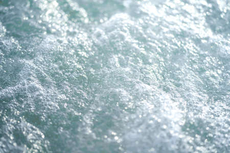 Background of closing up the bubble on surface sea wave on Kata beach at Phuket Thailand in...