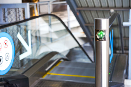 LED green light arrow Signage stainless pole in front of escalator sign the passenger the right way...
