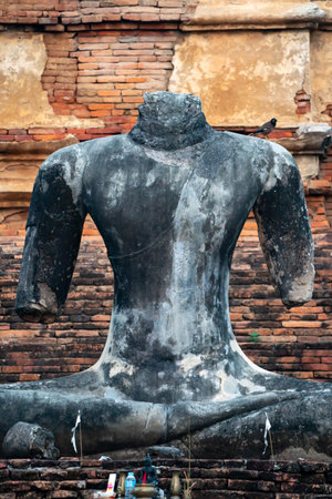 Broken Buddha statue, It was broken at Chiangrai Province, North of Thailand.の写真素材