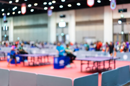 Defocus blur background of Table Tennis tournament competition in an indoor stadium.の写真素材