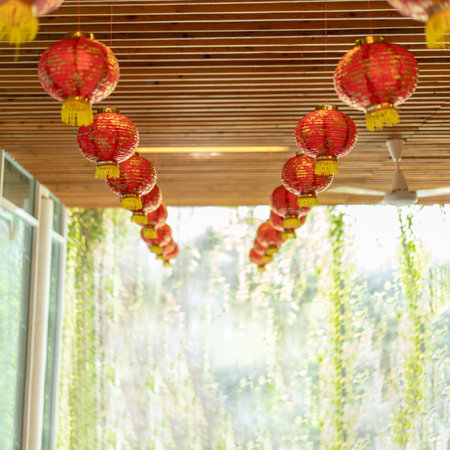 Traditional Chinese red lamps are hung for decoration in Chinese event.