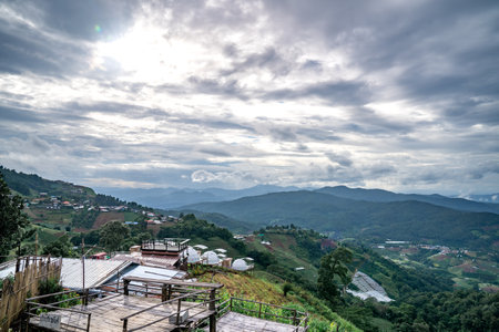 An aerial photographic view of Mon Jam Village in Chiangmai, filled with houses, resorts, and homestays for all the visitors.の写真素材
