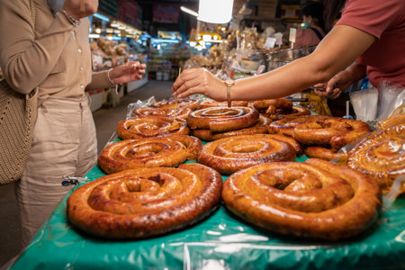 Sai Aua, Northern Thailand Spicy Sausage is a famous Traditional Local saurage cooked with curry and herb, lay on shop and ready for sales.の写真素材