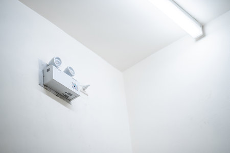 EMERGENCY LIGHT is charging and power pluging on the wall that ready to use when the power went out.