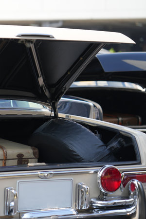 A classic car trunk with polished chrome and vintage design, show the automotive craftsmanship and...