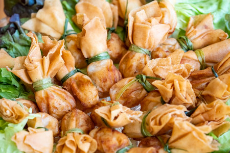 Thung thong is Thai fried bag dumplings made from pork and vegetables that are wrapped in dumplings...