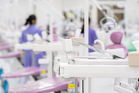 Many modern dental equipment and seats in a hygiene and sterile dental training room in the...