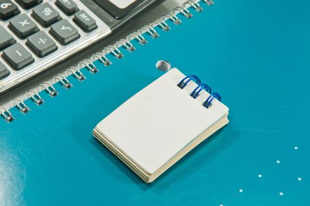 a white small notebook close upの写真素材