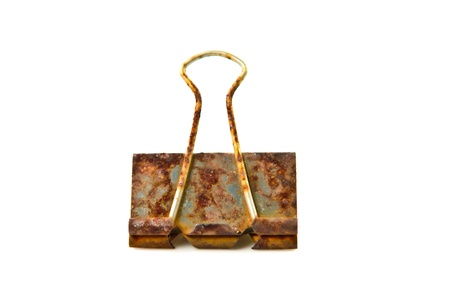 rust paper clip on white background