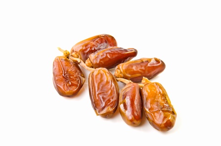 dates fruit close up on white background