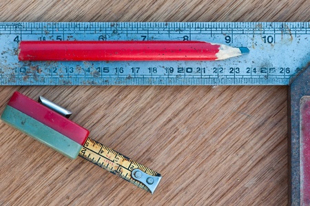 Carpenter's tools on wood backgroundの写真素材