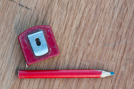 Carpenter's tools on wood backgroundの写真素材