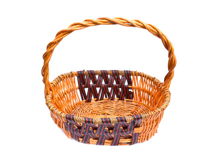 old wicker basket  on white backgroundの写真素材