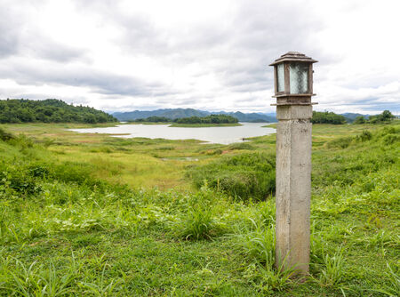 The lamps are made with wood at the edge of the lakeの写真素材