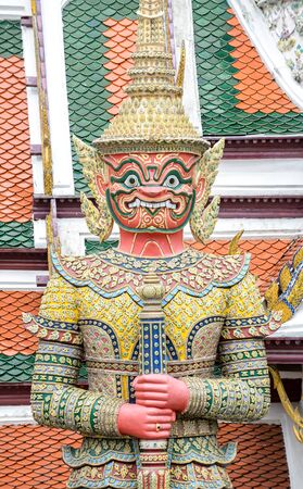 colorful giant statue in Thai templeの写真素材