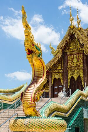 beautiful serpent statue at ancient temple in thailandの写真素材