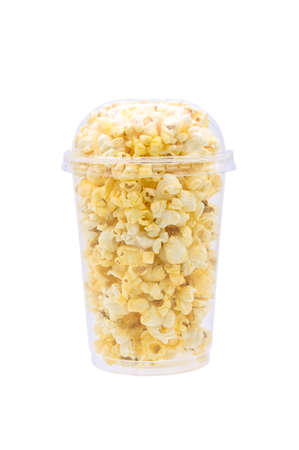 colorful popcorn in plastic cup on white backgroundの写真素材