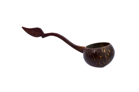 Dipper made from coconut shell isolated on white backgroundの写真素材