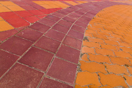 Curved pedestrian sidewalk in a nice park in the suburbs of Ayutthaya, Thailand.の写真素材