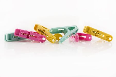 Clothes Pegs on White Background