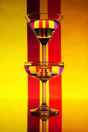 glass on a colors background with the reflex.の写真素材