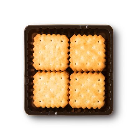 Dry crackers and cream cheese isolate on white background with clipping pathの写真素材