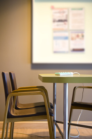 Small business working area Chairs, table, cable plug