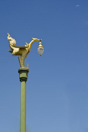 Gold swan light pole in the public road, Thailandの写真素材