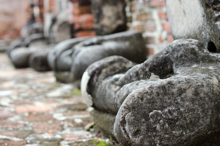 Old damaged Buddha in Thai contemporary temple in Ayuthaya, Thailandの写真素材