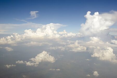 Clear blue sky with white cloud on a summer shiny dayの写真素材