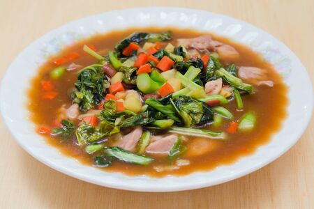 Mixed fried vegetable herb with oyster sauce – thai home made food
