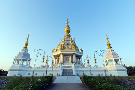 White buddha pagoda temple in Wat Thung Set Thi temple with clear blue sky in Khon Kaen province...