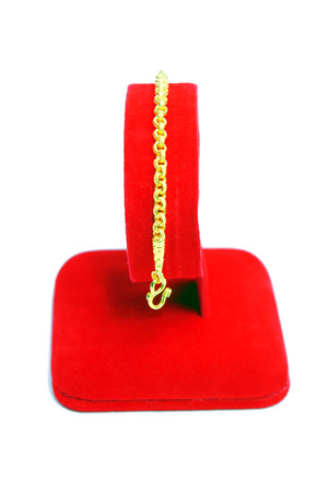 Gold pendant bracelet with special Thai gold design isolated on white backgroundの写真素材