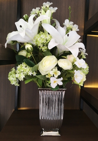 Flowers bouquet arranging in a vase for home decoration or graphic resourceの写真素材