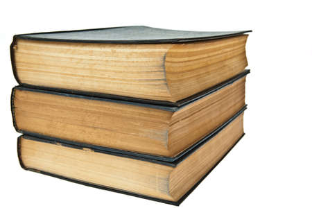 Stack of old books isolated on white backgroundの写真素材