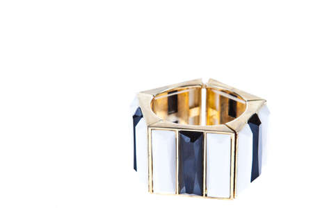 bracelet with white and black color stones isolated on white backgroundの写真素材